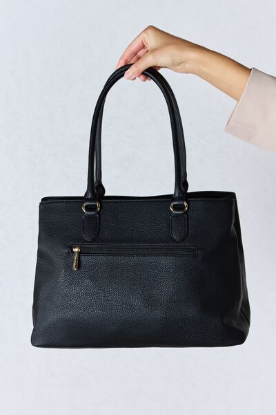 Structured Leather Handbag by David Jones